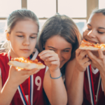 A sports team celebrating victory with Bertucci's